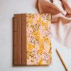 Cuaderno de sueños dorado y marrón 10